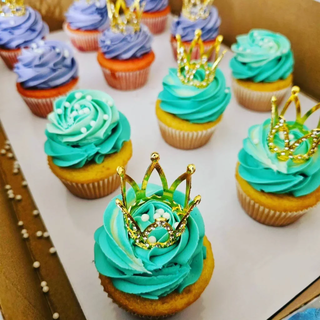 turquoise and purple decorated cupcakes